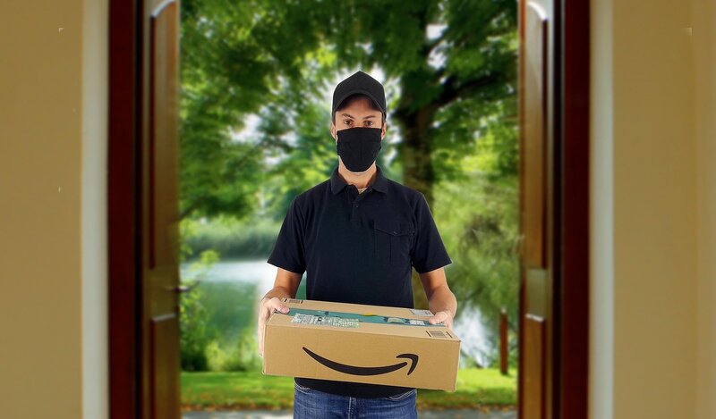 Urgent Courier Service in Oxford - Professional courier in uniform delivering packages